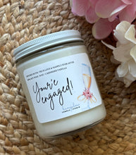 Load image into Gallery viewer, Your'e engaged Wedding soy wax candle  in the Bungalow Celebration Collection in an8oz glass jar.