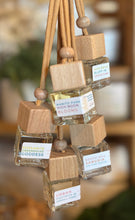 Load image into Gallery viewer, A group of Spring and Summer scented car diffusers displayed together.