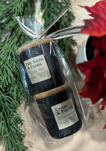 Load image into Gallery viewer, One of the duet gift sets from the Cascade Collection: A pair of mini 4 oz candles together in the scents of Palo Santo & Cassis and Cedar & Forest.