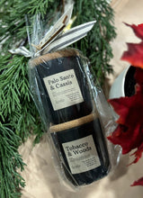 Load image into Gallery viewer, One of the duet gift sets from the Cascade Collection: A pair of mini 4 oz candles together in the scents of Palo Santo & Cassis and Tobacco & Woods.