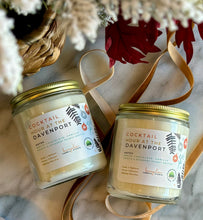Load image into Gallery viewer, The Cocktail Hour at the Davenport scent in a glass jar with gold lid from Bungalow's Winter Candle Collection.