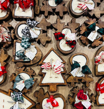 Load image into Gallery viewer, Wooden Dough Bowl candles in decorative shapes, tied with decorative ribbon on a wooden surface