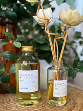 Load image into Gallery viewer, Guava & Gardenia 8oz Refill bottle displayed with the reed diffuser made by Bungalow Candle Studio