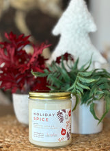 Load image into Gallery viewer, The Holiday Spice scent in a glass jar with gold lid from Bungalow's Winter Candle Collection.
