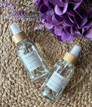 Load image into Gallery viewer, Two linen spray bottles in the Orchid & Banille scents from Bungalow's Classic Collection.