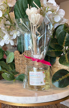 Load image into Gallery viewer, Reed Diffuser with floral reeds from the Spring and Summer Scent Collection in Post Falls Barns and Blossoms scent.
