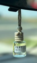 Load image into Gallery viewer, The Pure Maui Car Diffuser from the Coastal Collection hanging from the rearview mirror.