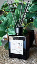 Load image into Gallery viewer, Wood Reed Diffuser in black glass container in Orange Scent