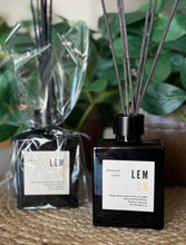 Load image into Gallery viewer, Wood Reed Diffuser in black glass container in Lemon Scent
