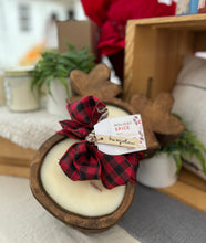 Load image into Gallery viewer, A hand-carved wood dough bowl candle in the shape of a reindeer with a checkered red and black ribbon and a 'Holiday Spice' labeled tag.