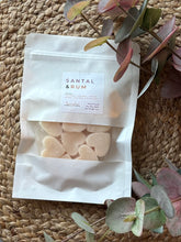 Load image into Gallery viewer, A package of heart shaped wax melts in the Santal & Rum scent from the Classic Collection.