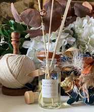 Load image into Gallery viewer, The Santal & Rum Scent in a reed diffuser from the Classic Collection shown with straight wood reeds.