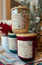 Load image into Gallery viewer, 10 oz colored holiday jar candles in the Fall and Winter Tri-Cities Collection.