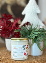 Load image into Gallery viewer, The Vanilla Peppermint scent in a glass jar with gold lid from Bungalow's Winter Candle Collection.