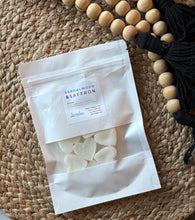 Load image into Gallery viewer, A package of heart shaped wax melts in the Sandalwood & Saffron scent from the Classic Collection.
