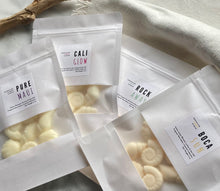 Load image into Gallery viewer, 4 packages of Sea shell shaped wax melts from the Coastal Collection grouped together.