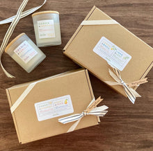 Load image into Gallery viewer, Two Duo gift Sets together with two 8oz candles next to them.