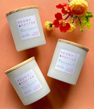 Load image into Gallery viewer, Three 8 oz candles in the Peony & Nectar scent from Bungalow's Classic Collection are shown grouped together.