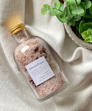 Load image into Gallery viewer, Apothecary jar with bath salts and dried botanicals on a textured white cloth