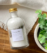 Load image into Gallery viewer, Apothecary jar with bath salts and dried botanicals on a wood table and textured white cloth
