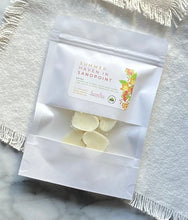 Load image into Gallery viewer, Heart-shaped Soy Wax Melts from the Bungalow Spring and Summer Collection in a white sealed package with a window in the Summer Haven in Sandpoint scent.