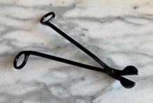 Load image into Gallery viewer, One wick trimmer in black matte lying on a marble surface