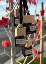 Load image into Gallery viewer, A group of car diffusers from the Cascade Collection.
