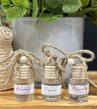 Load image into Gallery viewer, All three 10 ml car diffusers from the Tri-Cities spring and summer scent collection.
