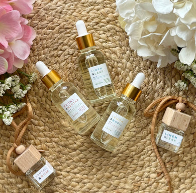 Two car diffusers and 3 car diffuser refills grouped together in scents from Bungalow's Classic Collection.