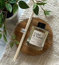 Load image into Gallery viewer, The Cedar &amp; Forest scent in a reed diffuser from the Cascade Collection.
