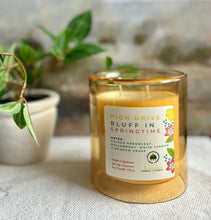 Load image into Gallery viewer, High Drive Bluff in Springtime Candle from the Spring and Summer Collection shown in a single upright yellow 12 ounce double glass jar.
