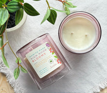 Load image into Gallery viewer, Manito Park High Noon Blooms Candle from the Spring and Summer Collection shown in purple 12 ounce glass jar.
