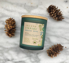 Load image into Gallery viewer, Inland Empire Rustic Pine Holiday Candle in frosted green jar with wooden lid.
