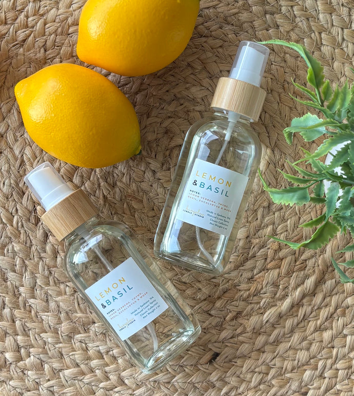 Two linen spray bottles in the Lemon & Basil scent from the Classic Collection.