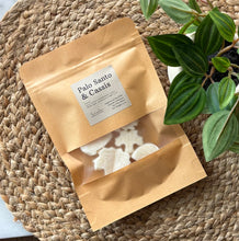 Load image into Gallery viewer, A package of soy wax melts from our Cascade Collection in the Palo Santo &amp; Cassis scent.
