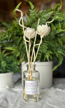 Load image into Gallery viewer, The Peony &amp; Nectar Scent in a reed diffuser from the Classic Collection shown with floral wood reeds.
