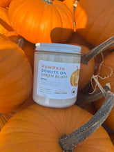Load image into Gallery viewer, Candle Jar with scent,&quot;Pumpkin donuts on Green Bluff&quot; sitting on a group of pumpkins
