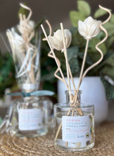 Load image into Gallery viewer, Reed Diffuser with floral reeds from the Spring and Summer Scent Collection in Urban Equinox @ Kendall Yards scent.
