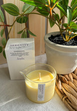 Load image into Gallery viewer, Massage serum candle in a beaker shaped jar in the scent of Serenity.
