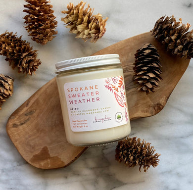 Bungalow's signature scent, Spokane Sweater Weather is shown in the classic 8 oz glass jar