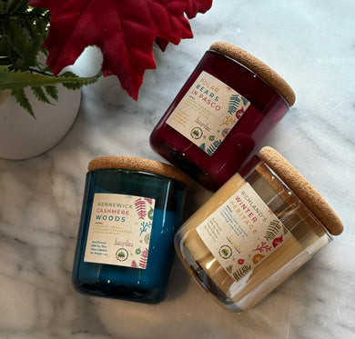 Group of the 4 oz mini soy candles in winter scents from the Tri-Cities Collection.