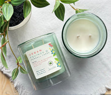 Load image into Gallery viewer, Urban Equinox @ Kendall Yards Candle from the Spring and Summer Collection shown in light green 12 ounce glass jar.
