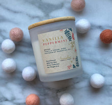 Load image into Gallery viewer, Bungalow&#39;s Vanilla Peppermint Holiday Candle in frosted white jar with wooden lid.
