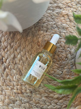 Load image into Gallery viewer, The Wild Surf Car Diffuser Refill in a 50 ml glass bottle with dropper.
