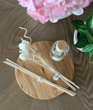 Load image into Gallery viewer, View of different wood reed options shown from above--floral or straight wood reeds.
