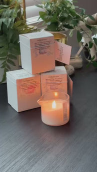 Massage Serum Candle being used by pouring serum on a hand and rubbing it in.