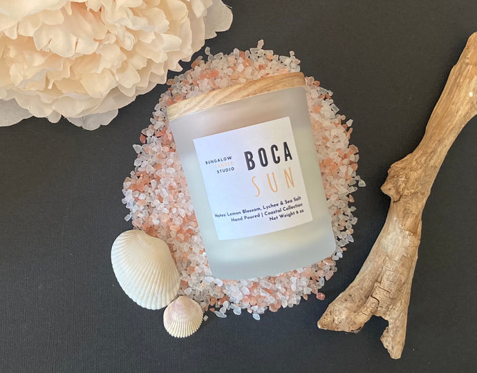 The Boca Sun Scent from the Coastal Collection is shown in the 6 oz size with a frosted glass jar.