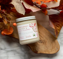 Load image into Gallery viewer, The Northwest Coffee &amp; Cozy Flannel candle scent from Bungalow&#39;s Fall Collection is shown in the 8 oz glass jar with a white lid.
