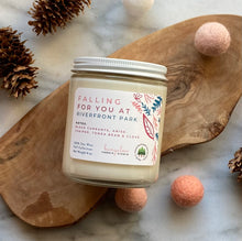 Load image into Gallery viewer, The Falling For You At Riverfront Park candle scent from Bungalow&#39;s Fall Collection is shown in the 8 oz glass jar with a white lid.
