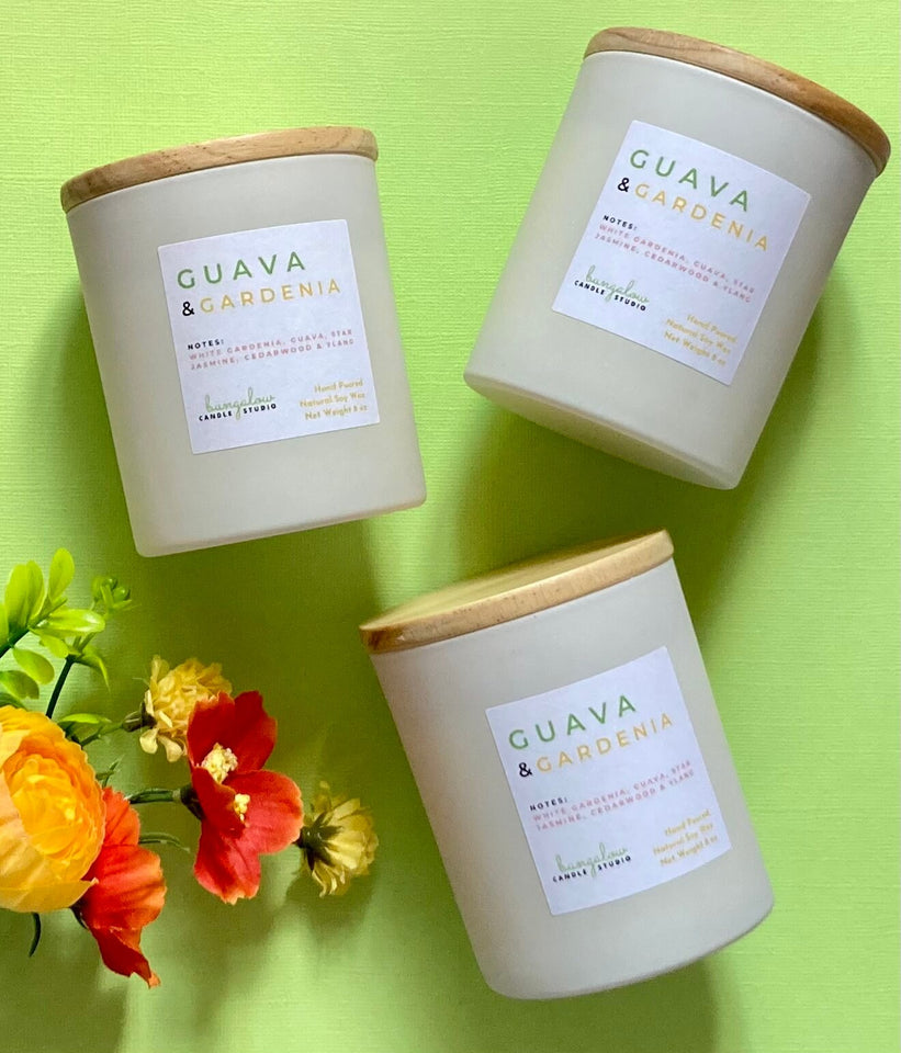 Three 8 oz candles in the Guava & Gardenia scent from Bungalow's Classic Collection are shown grouped together.